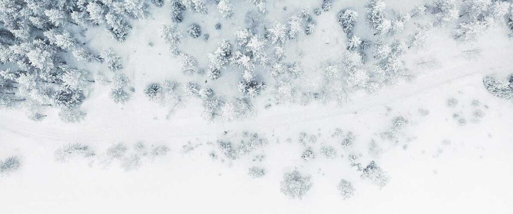 fresh-snow-on-mountain-road-gabriel-alenius-USXfF_ONUGo-unsplash